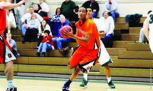 Sophmore Joe Emerusabe led the men’s basketball team with 14 points in 12 shots in the Bullets’ game against Washington College. 