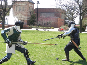 King Longfellow and Dominique Saunders pair off on Stine Lake during a friendly spar at a Fencing Club event last Saturday. Saunders won a silver medal the week before at Wilson College where the club participated in the annual Joyce Donatelli Invitational.