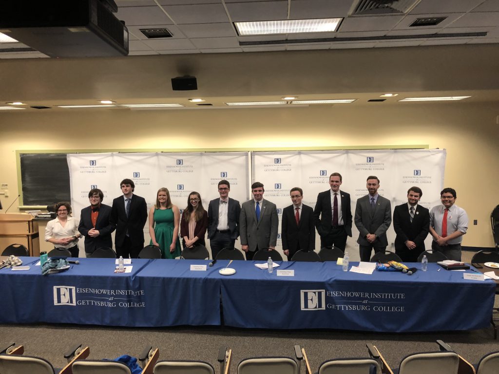 The club representatives pose for a photo after the debate. (Photo Jamie Welch/The Gettysburgian)