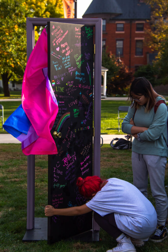 The National Coming Out Day event on Stine Lake on Oct. 12, 2022 featured a "closet" and pride flags that students could take photos with (Photo Eric Lippe/The Gettysburgian)