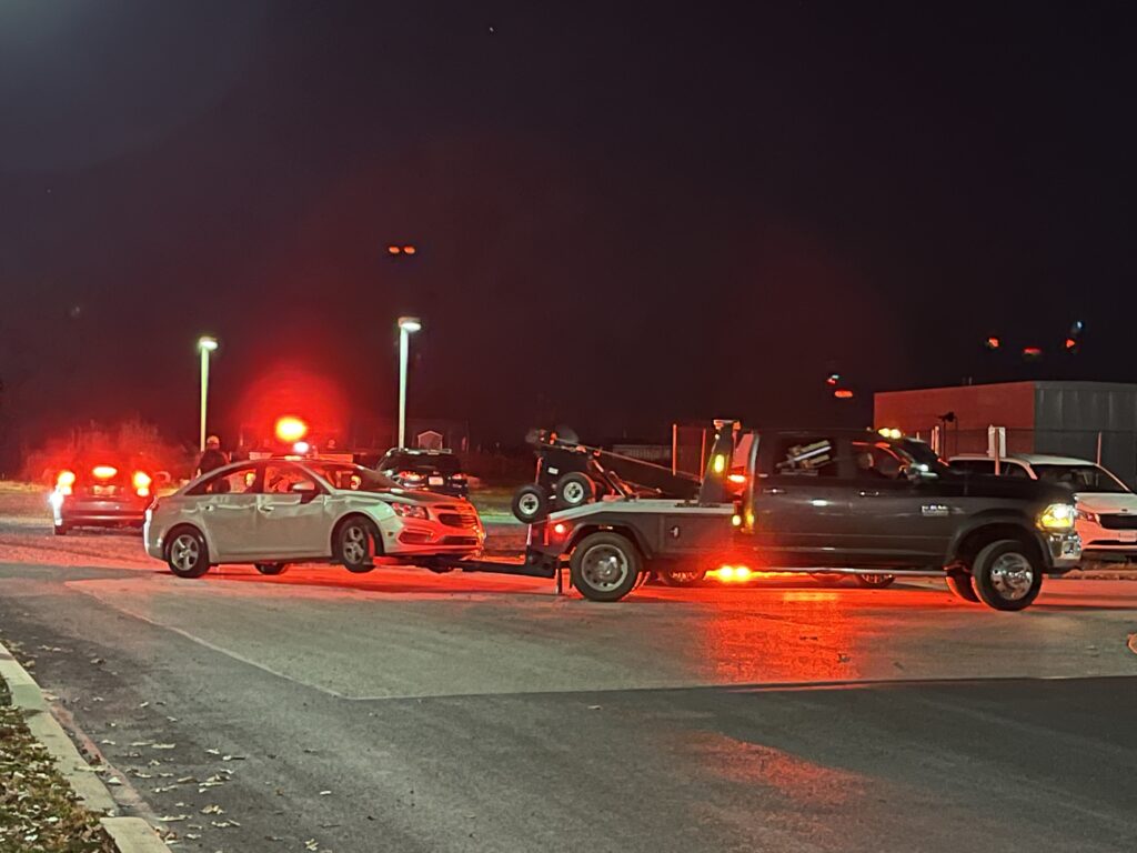 A vehicle was towed after being pulled out of Quarry Pond on Thursday, Nov. 3, 2022 (Photo Alli Dayton/The Gettysburgian)