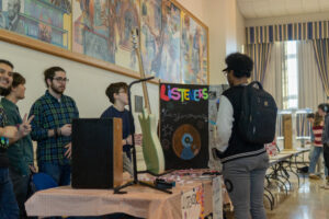 The Listeners & Performers club speaks with an interested student. (Photo William Oehler/The Gettysburgian)